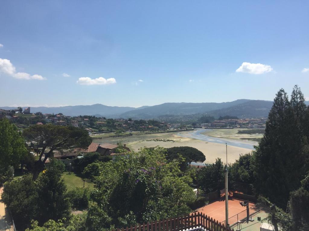 Apartamento adosado con terraza en Playa América, Nigrán Esterno foto